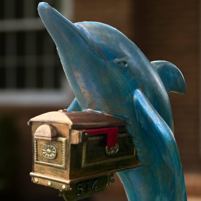 Dolphin sculpture holding mailbox at Statues and Sculpture Shop