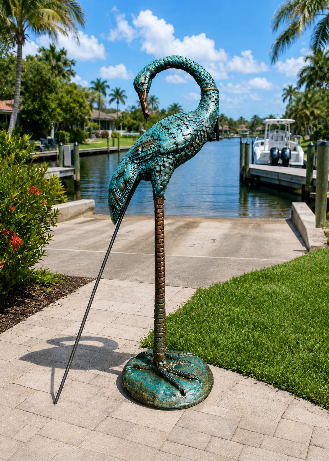 30-Inch Curved-Neck Heron Garden Statue in Ocean Patina hand-painted finish displayed in a landscaped outdoor setting