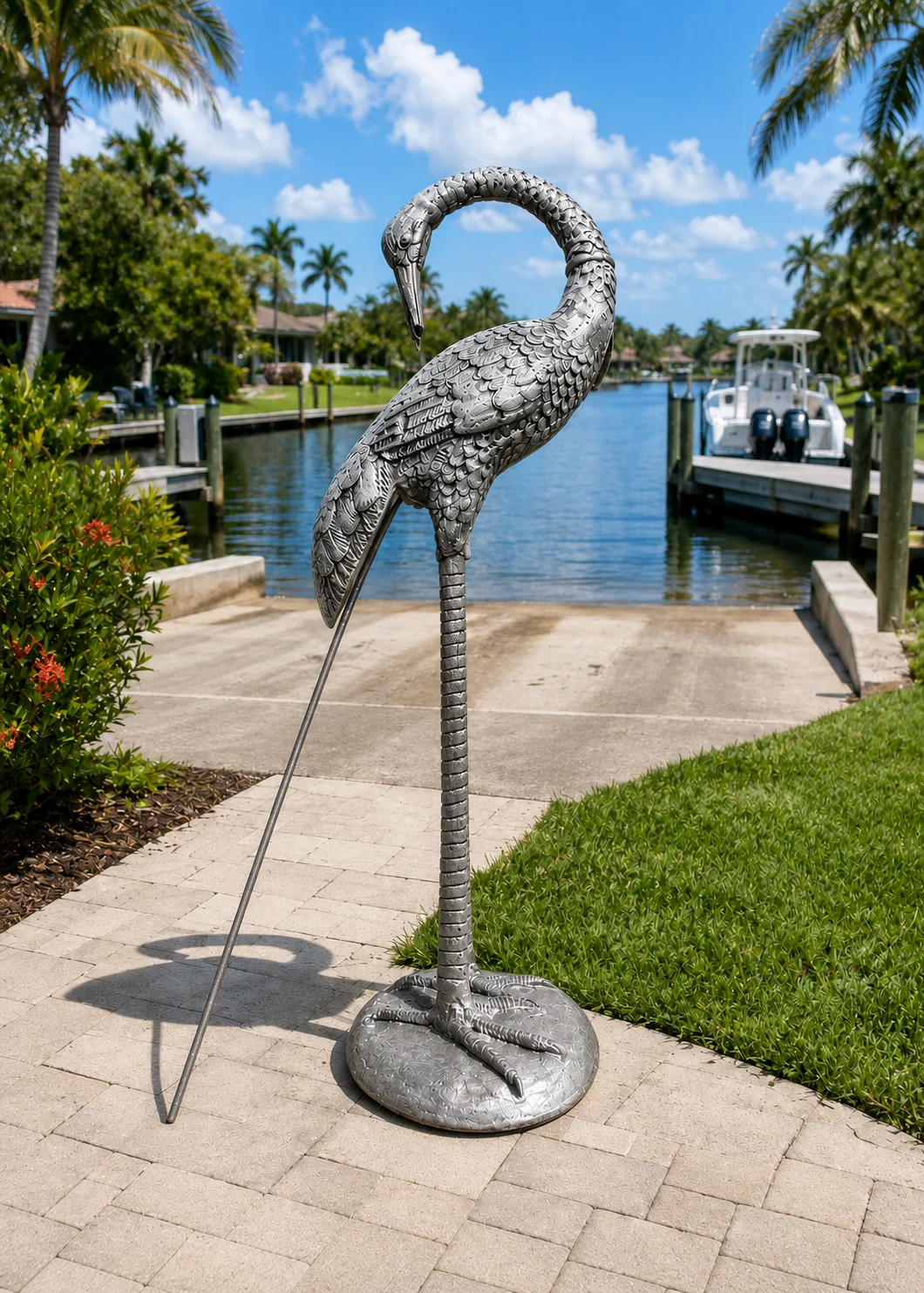 30-Inch Curved-Neck Heron Garden Statue in Silver Patina hand-painted finish displayed in a landscaped outdoor setting