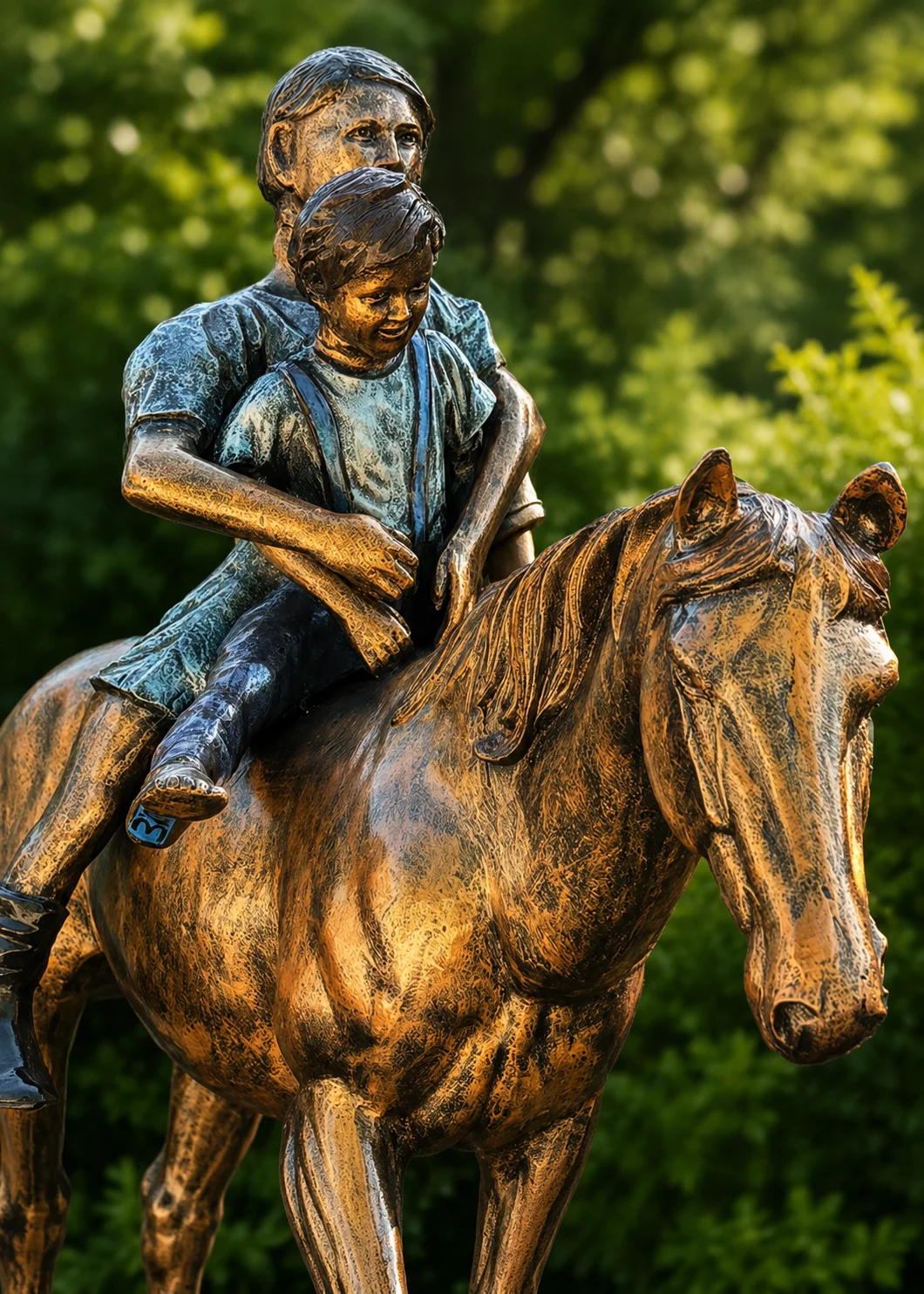 Life size horse statue with riders at statues and sculpture shop